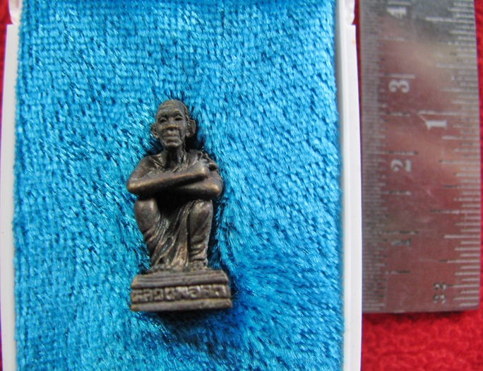 สินค้าหมดค่ะ รูปเหมือนหลวงพ่อคูณ รุ่นเอกลักษณ์ วัดบ้านไร่ พ.ศ.2533 พร้อมกล่องเดิมค่ะ