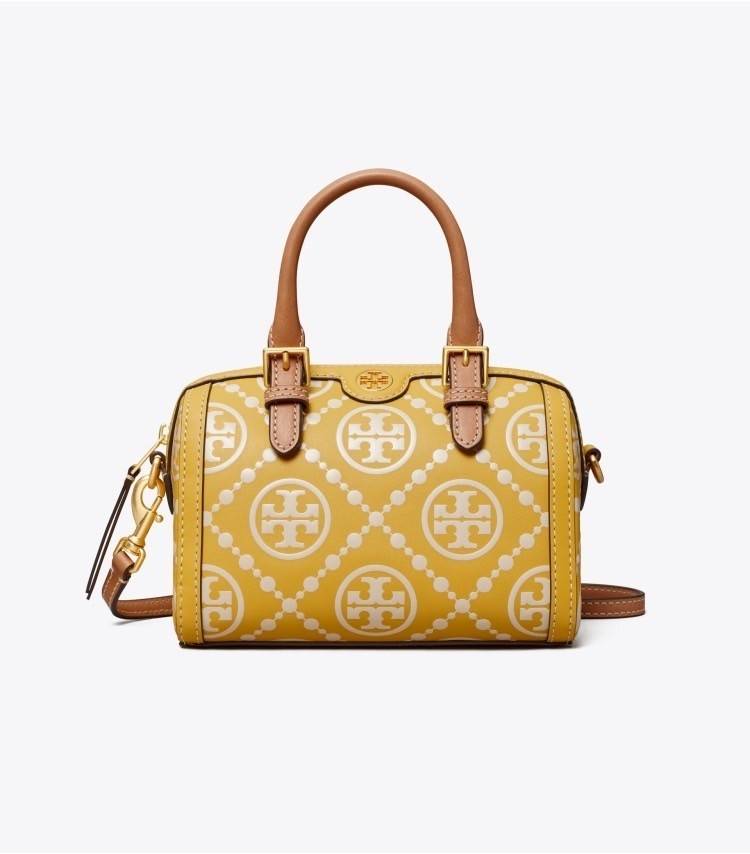 Tory Burch T-Monogram Mini Embossed Wine Bucket Bag / Tory Burch Mini Bucket กระเป๋าถือหรือสะพายไหล่ ทรงหมอนขนาดเล็ก ประดับด้วยลวดลายอันเป็นสัญลักษณ์ของแบรนด์ ถูกประดิษขึ้นด้วยความพิถีพิถันวัสดุหนังอย่างดี ด้านในบุด้วยหนังไมโครซูแอคเนื้อนุ่มทำความสะอาดง่า