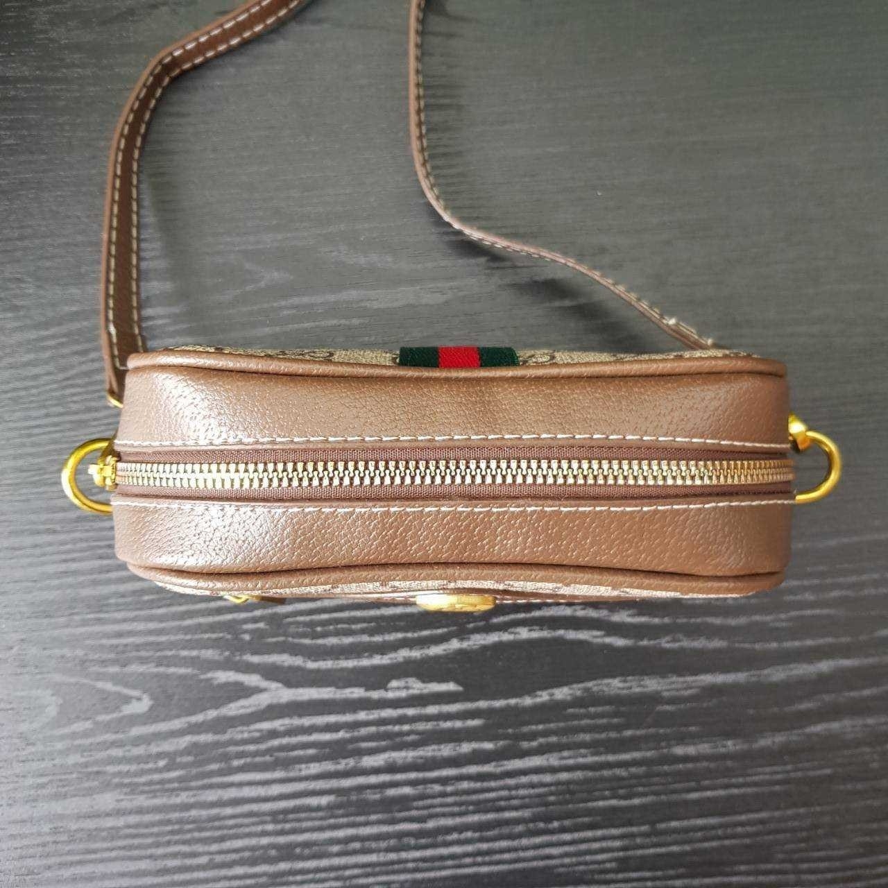 GUCCI Ophidia GG Crossbody Bag กระเป๋าครอสบอดี้ขนาดกำลังดี ดีไซน์ที่เป็นเอกลักษณ์ ใช้ได้ทุกโอกาส สายยาวปรับระดับได้ เปิด-ปิด ด้วยซิบ