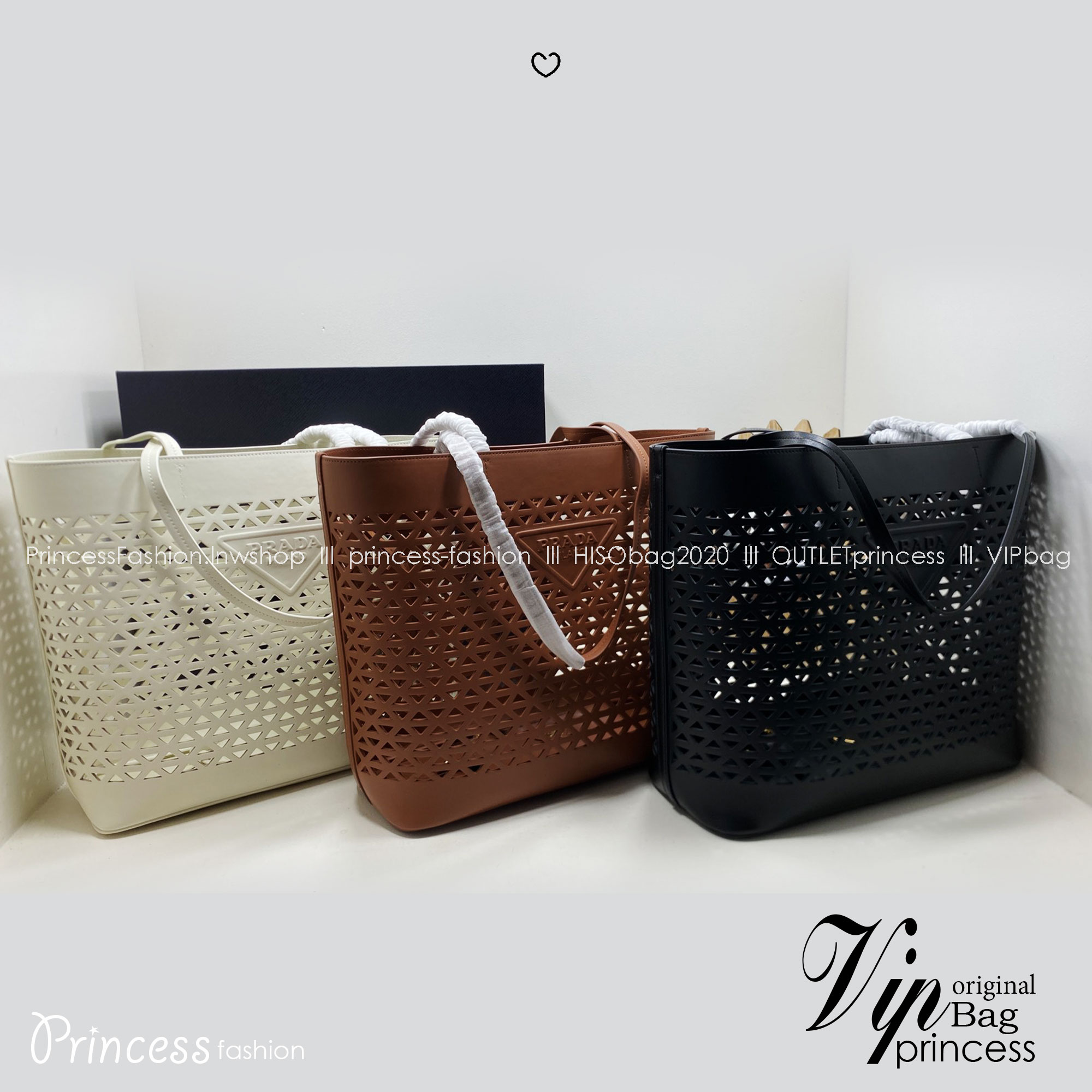 TOP ORI หนังแท้ | Prada Large perforated leather tote bag กระเป๋าทรงโท้ทใบใหญ่ ใจบางที่สุดกับคอลเลคชั่นนี้ ที่เพิ่มดีเทลความแพงด้วยการฉลุลวดลายรอบใบ ถักทอเป็นเส้นลายสานที่สวยงามมาก งานฝีมือจริงๆ