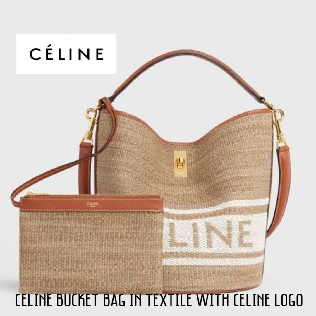 Celine Bucket Bag In Textile with Celine Logo สาว ๆ คนไหนกำลังมองหากระเป๋าสะพายที่สามารถจุของได้แบบกำลังพอดี เราขอแนะนำเป็นใบนี้เลยค่ะ เพราะมีขนาดที่ไม่เล็กและไม่ใหญ่จนเกินไป ให้ความคล่องตัวสูง มีฐานกว้างสามารถใช้สะพายไหล่เมื่อต้องการออกงานทางการหรือจะสะพ