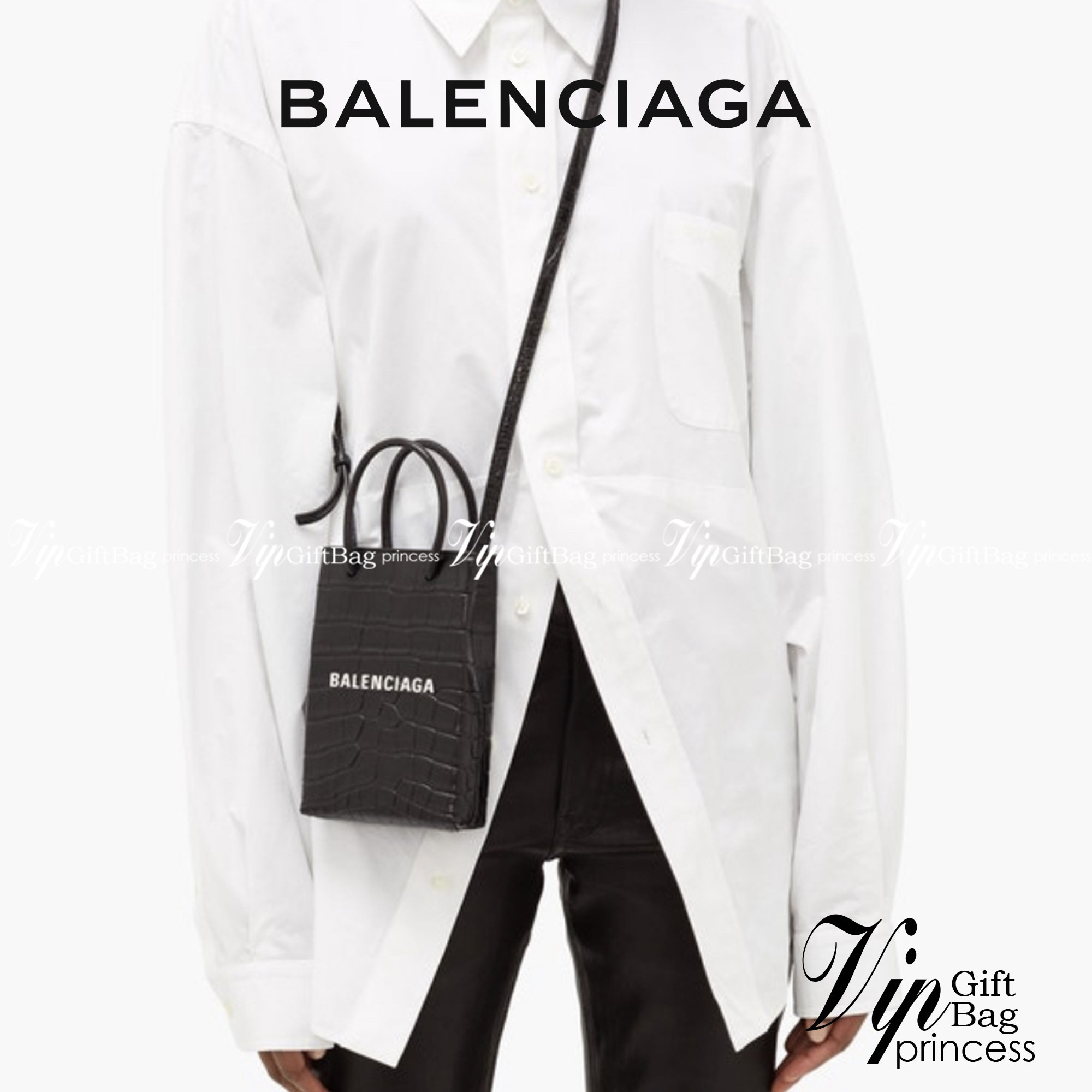 หนังแท้ BALENCIAGA Shopping Phone Pouch leather tote พกกระเป๋าช้อปปิ้งขนาดมินิ ไปทุกที่ในฤดูกาลนี้ ดีไซน์ที่ใช้ได้ทุกวันตั้งแต่หนังแบบมีเท็กซ์เจอร์ ภาพสินค้าถ่ายจากงานขายจริง ใช้งานต่างประเทศได้