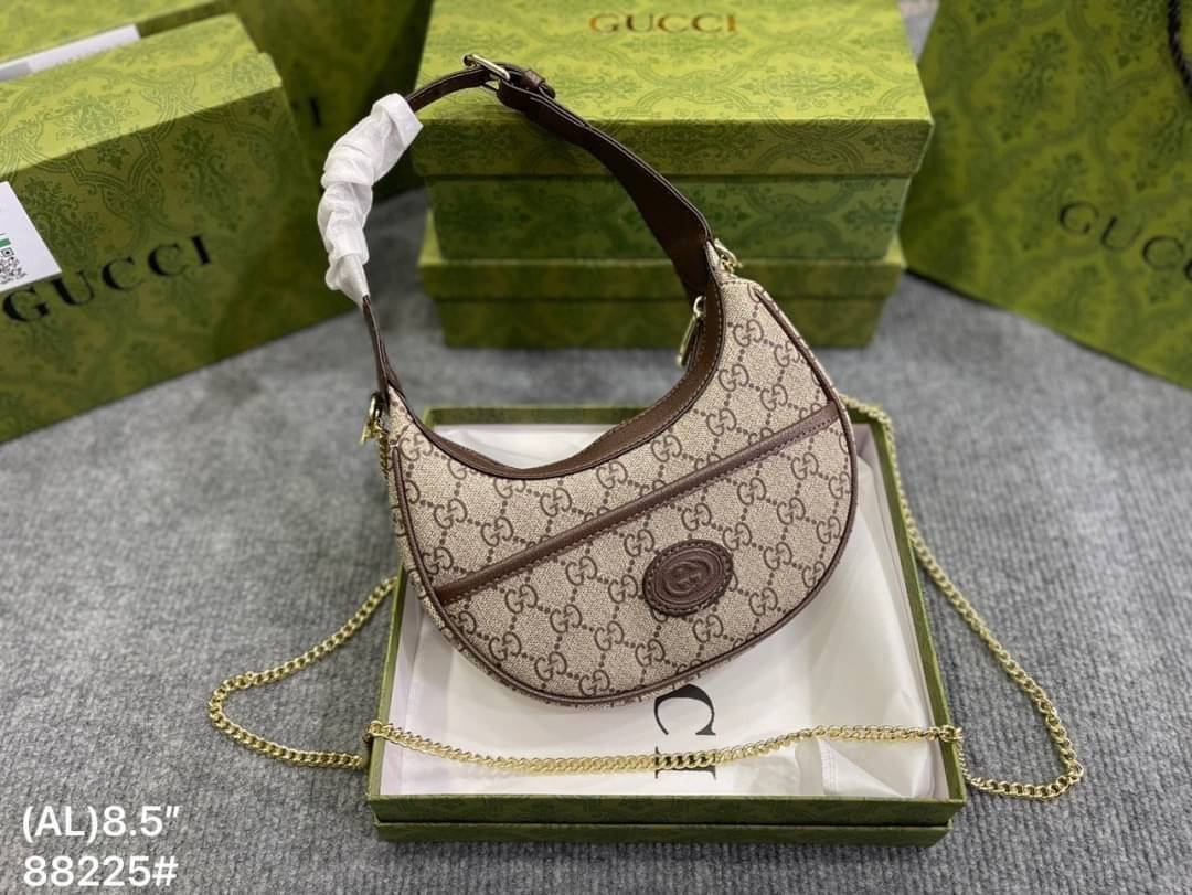 GUCCI half-moon Ophidia mini shoulder bag กระเป๋าสะพายไหล่รูปทรงพระจันทร์เสี้ยว Canvas GG Supreme กระเป๋าขนาดมินิให้ความรู้สึกย้อนยุคอันโดดเด่น สไตส์วินเทจ
