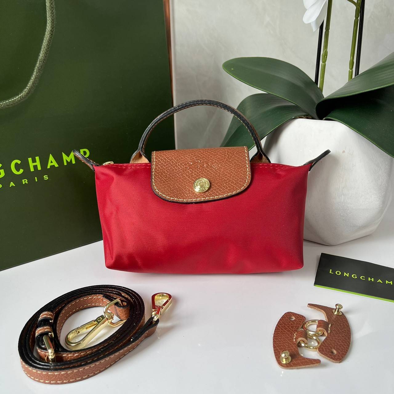 LONGCHAMP LE PLIAGE ORIGINAL Pouch with handle กระเป๋าใบเล็กขนาดกระทัดเหมาะกับใส่ของจำเป็นจุกจิก กันน้ำได้ พร้อมส่ง