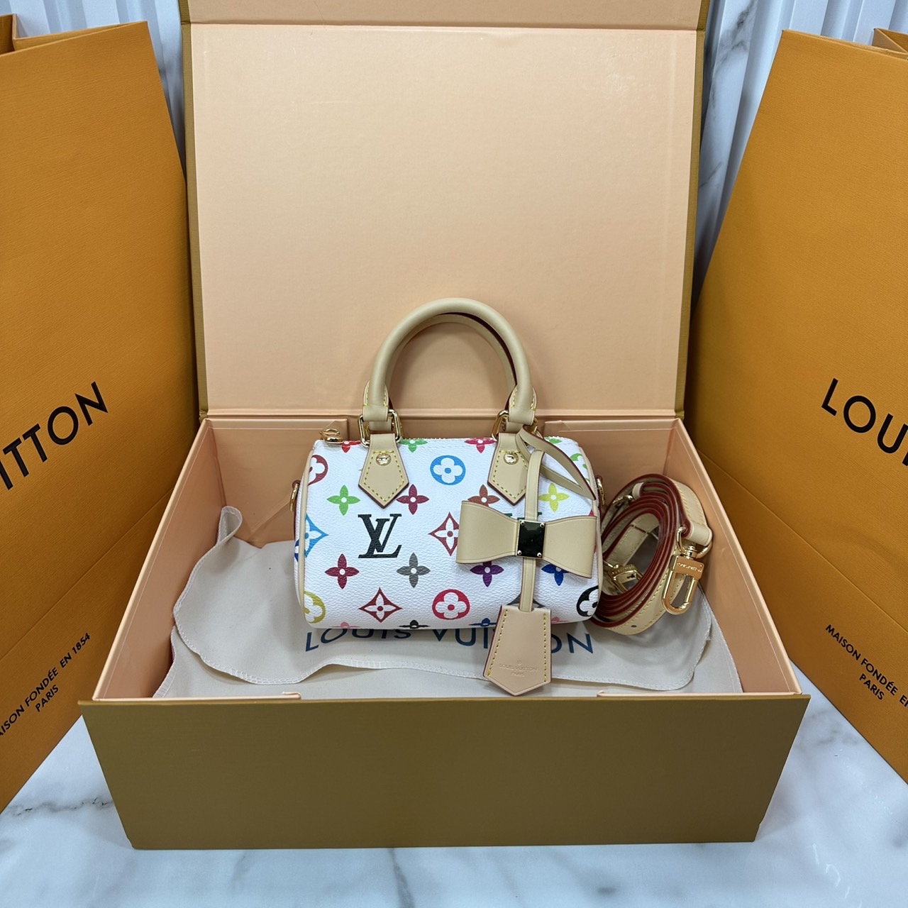 ORI | LV x TM Nano Speedy Bag Murakami กระเป๋าสะพายสปีดี้นาโนไซส์เล็ก เผยความมีชีวิตชีวาปรับดีไซน์โทนสีสดใส สวยเรียบหรู ผู้ดี