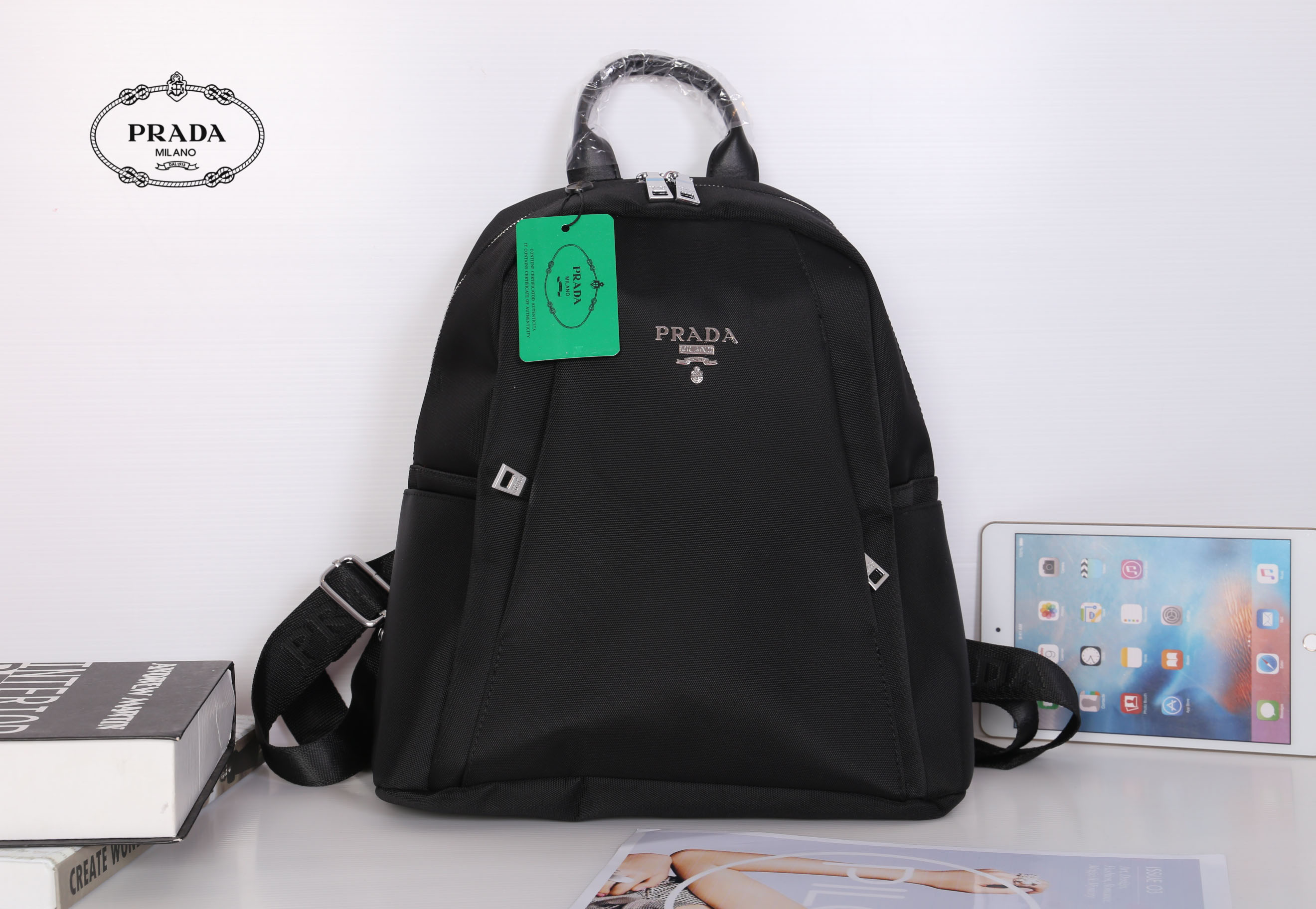 PRADA NYLON BACKPACK กระเป๋าเป้ Limited edition VIP Gift With Purchase (GWP) จากเคาน์เตอร์แบรนด์วัสดุ Nylon&Polyester เนื้อหนาคุณภาพดี น้ำหนักเบา ด้านหน้าประดับโลโก้แบรนด์ เปิดปิดด้วยซิป หูจับคุณภาพดีแข็งแรง สายสะพายหลังลายแบรนด์เลื่อนปรับได้ ด้านในโล่งกว