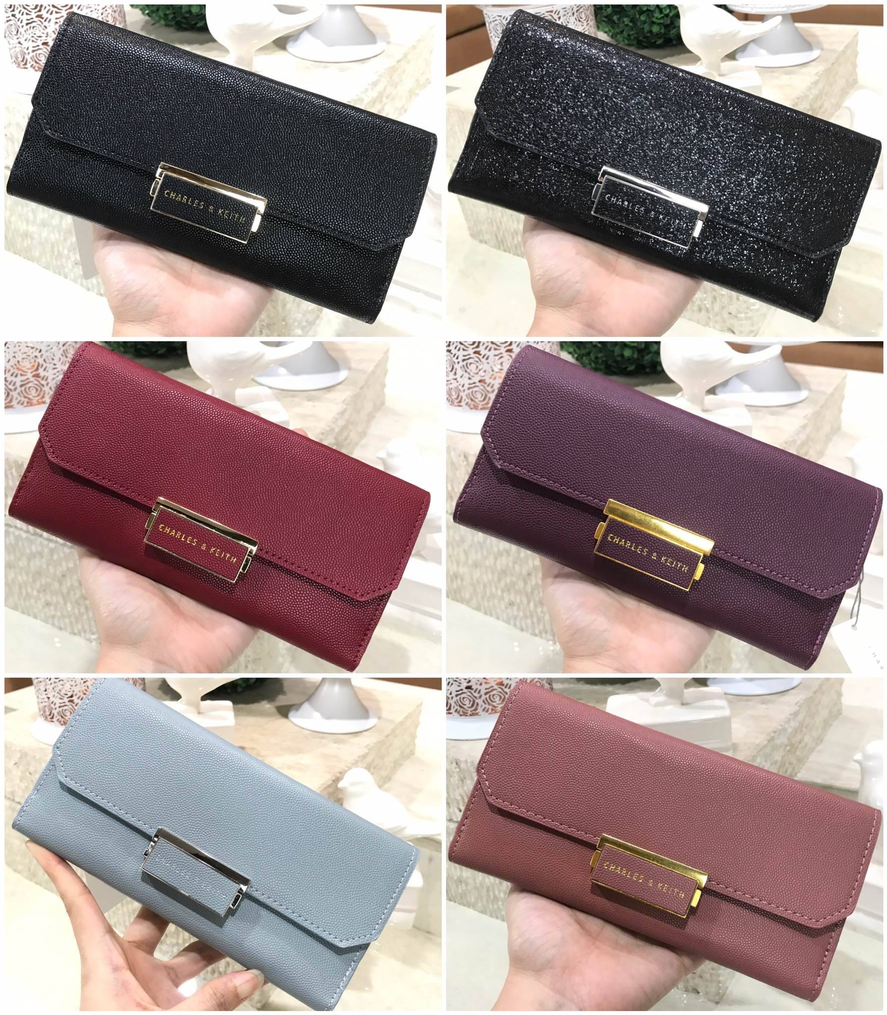 Don't Miss! CHARLES & KEITH LONG WALLET กระเป๋าสตางค์ใบยาวฝาพับรุ่นใหม่ลาสุด หนังอยู่ทรงเเข็งแรงทนทานด้านหน้าประดับโลโก้แบรนด์แบบเหลี่ยม สามารถใช้งานได้2ด้าน ด้านหน้าเปิดปิดด้วยตัวล๊อค ด้านหลังเปิดปิดด้วยกระดุมมีช่องใส่ธนบัตรและช่องใสบัตรหลายช่อง ภาย