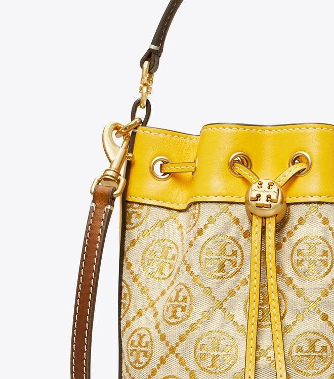 ของแท้ 💯% 】Tory Burch Monogram Jacquard Mini Bucket Bag กระเป๋าถือหรือสะพายไหล่ วัสดุผ้า Canvas โลโก้ Jacquard ทรงถัง ตั้งอยู่ทรง กระเป๋าปักลายแบรนด์ สวยหรู