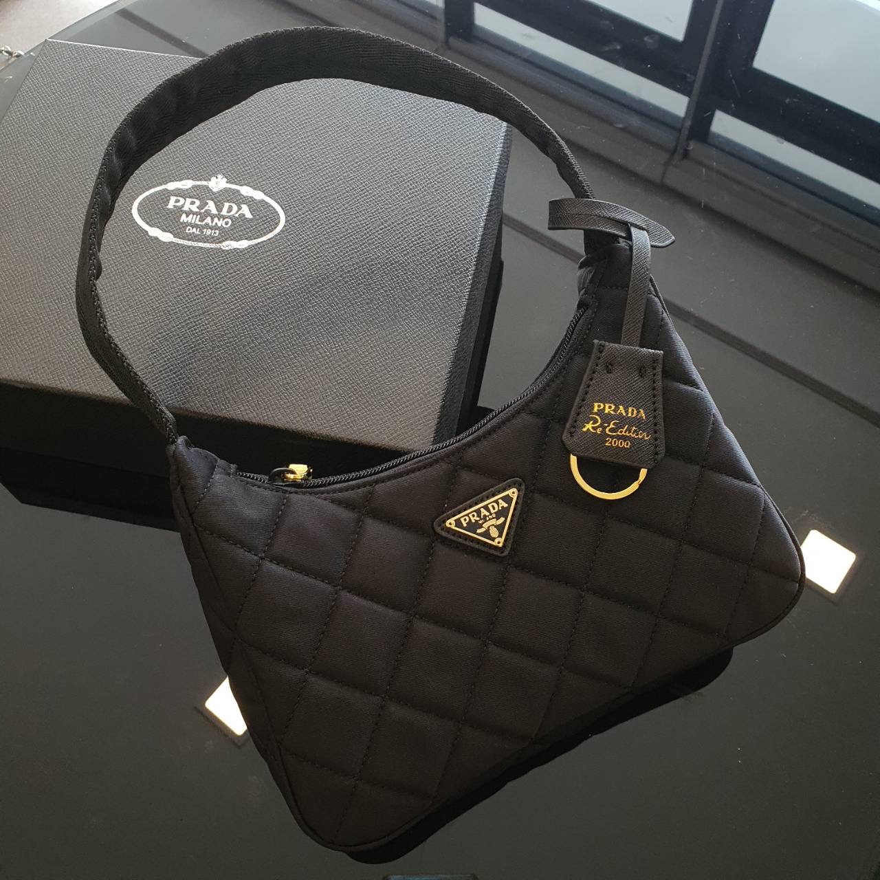 Prada Hobo Mini Quilted Black Nylon Shoulder Bag / PRADA NYLON HANDBAGS ขนาดกะทัดรัด อะไหล่ทอง วัสดุทำจากผ้าNylon ลายตาราง อย่างหนา อยู่ทรง กันน้ำได้ หายห่วงคะ