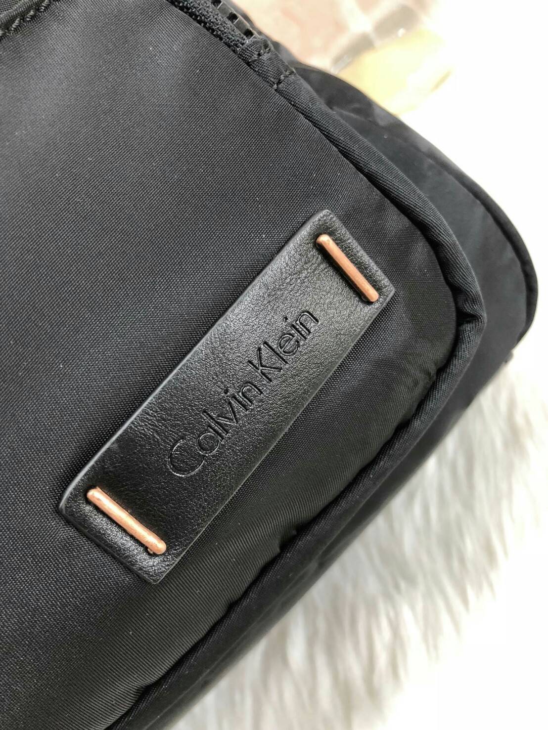 Calvin Klein Nylon Mini Backpack - New arrival !!! กระเป๋าสะพายหลัง วัสดุ nylon คุณภาพดี เนื้อผ้าลื่นแวว - ด้านหน้าติดโลโก้แบรนด์ มีช่องใส่ของจุกจิก 2 ช่อง - เปิดปิดกระเป๋าด้วยซิปคู่ ที่จับเป็นหนัง ช่องหลักภายใน โล่งกว้าง จุได้เยอะค่ะ