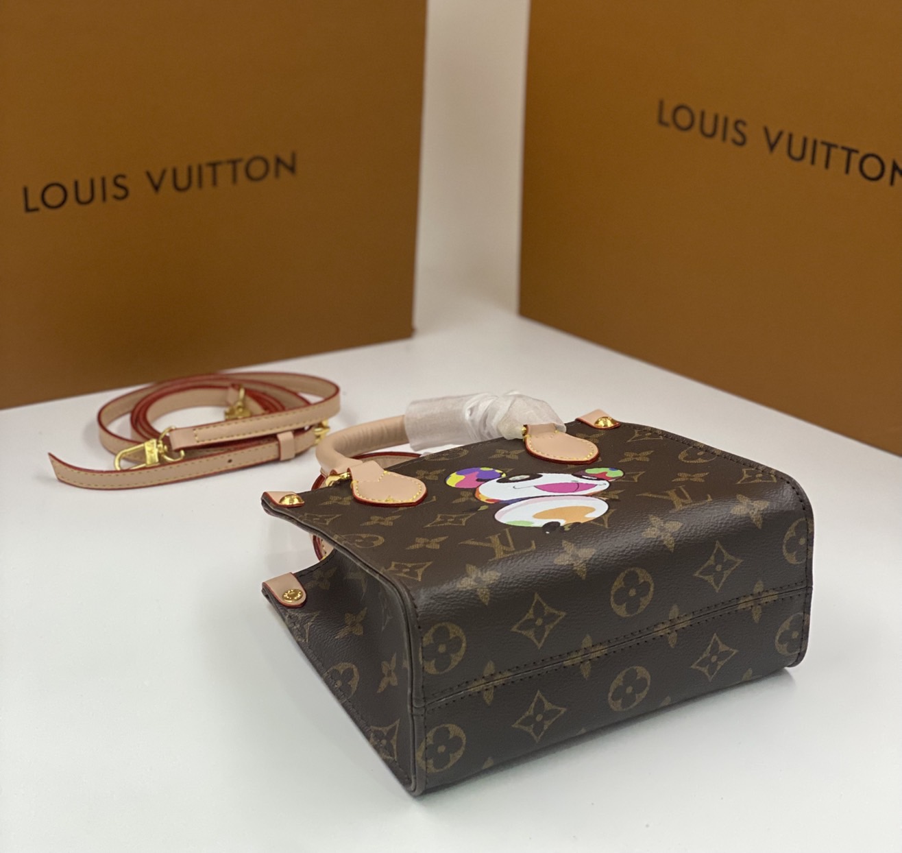 ORI | LV x TM OnTheGo BB Tote Bag กระเป๋าทรงโท้ทไซส์เล็กหนังแท้แคนวาสแท้ คอลใหม่พิมพ์ลาย Murakami สีสันสดใส