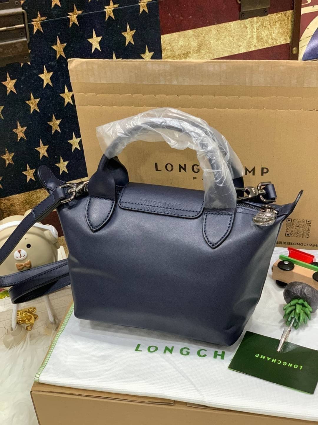 ของแท้ 100% Longchamp LE PLIAGE CUIR TOP HANDLE BAG Color: Black,Orange,Sienna, Navy,Nordic,Grey,Lichen