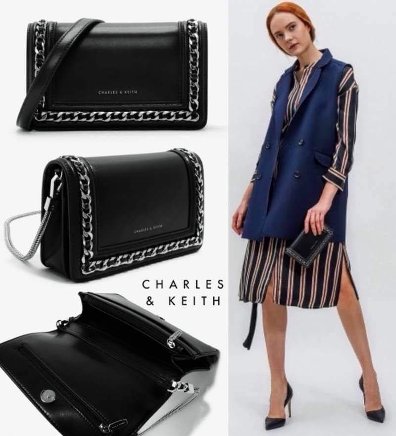BEST SELLER! CHARLES & KEITH CHAIN DETAIL CROSSBODY BAG กระเป๋าสะพายทรงสี่เหลี่ยมรุ่นชนช็อปขนาดกำลังดีวัสดุหนังนิ่มเรียบประดับด้วยโซ่สีเงินด้านหน้าดูมีดีเทล เปิดปิดด้วยกระดุมแม่เหล็ก ภายในมีช่องใส่บัตรและช่องซิป มาพร้อมสายโซ่ต่อหนังถอดถือเป็นคลัชได้ ภาพถ่