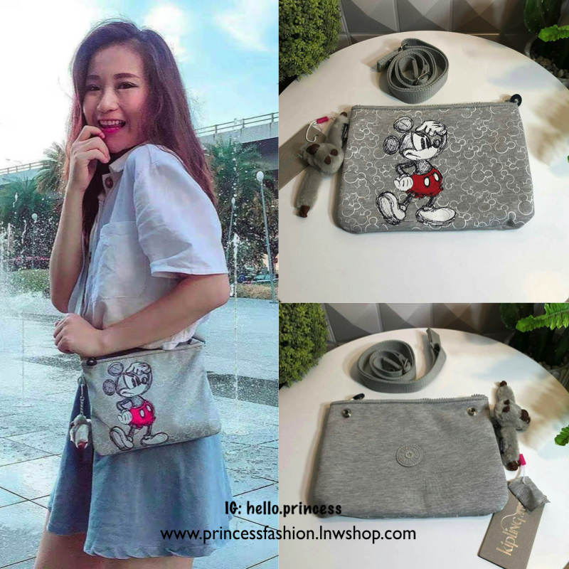 Kipling MAY Small 2-in-1 Pouch and Crossbody กระเป๋าสะพายหรือคาดเอว ขนาดมินิรุ่น Limited ทรงน่ารัก น้ำหนักเบา ใช้ได้ทั้งสองด้าน ด้านหน้ามีสกรีน mickey mouse ด้านหลังประดับโลโก้ มาพร้อมพวงกุญแจแบรนด์ เปิดปิดด้วยซิปสะดวกใช้ หัวซิปแบรนด์ มีหนึ่งช่องซิป และสา