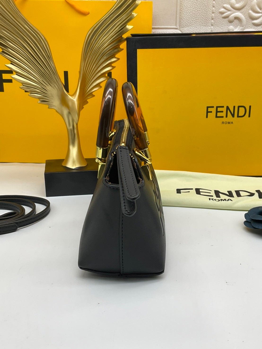 FENDI By The Way Mini Bag พร้อมส่งที่ไทย ภาพถ่ายจากงานขายจริง Iconic mini By The Way Boston bag made FENDI ROMA lettering and rigid tortoiseshell-effect plexiglass handles.