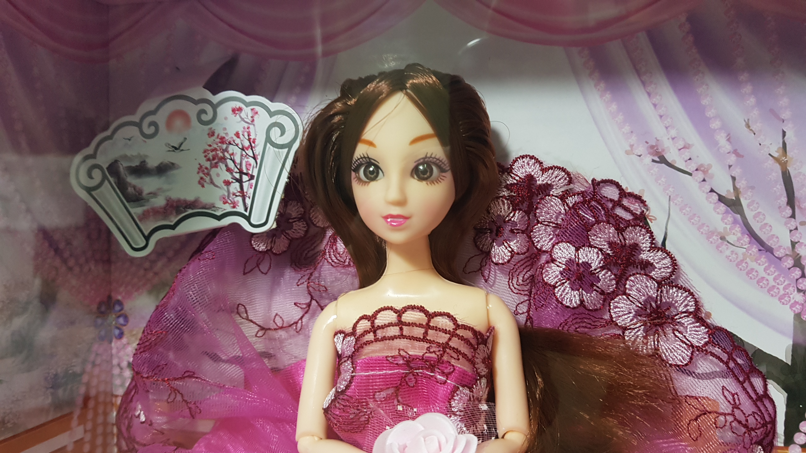 ตุ๊กตาเด็กผู้หญิงชุดเดรสสีชมพู