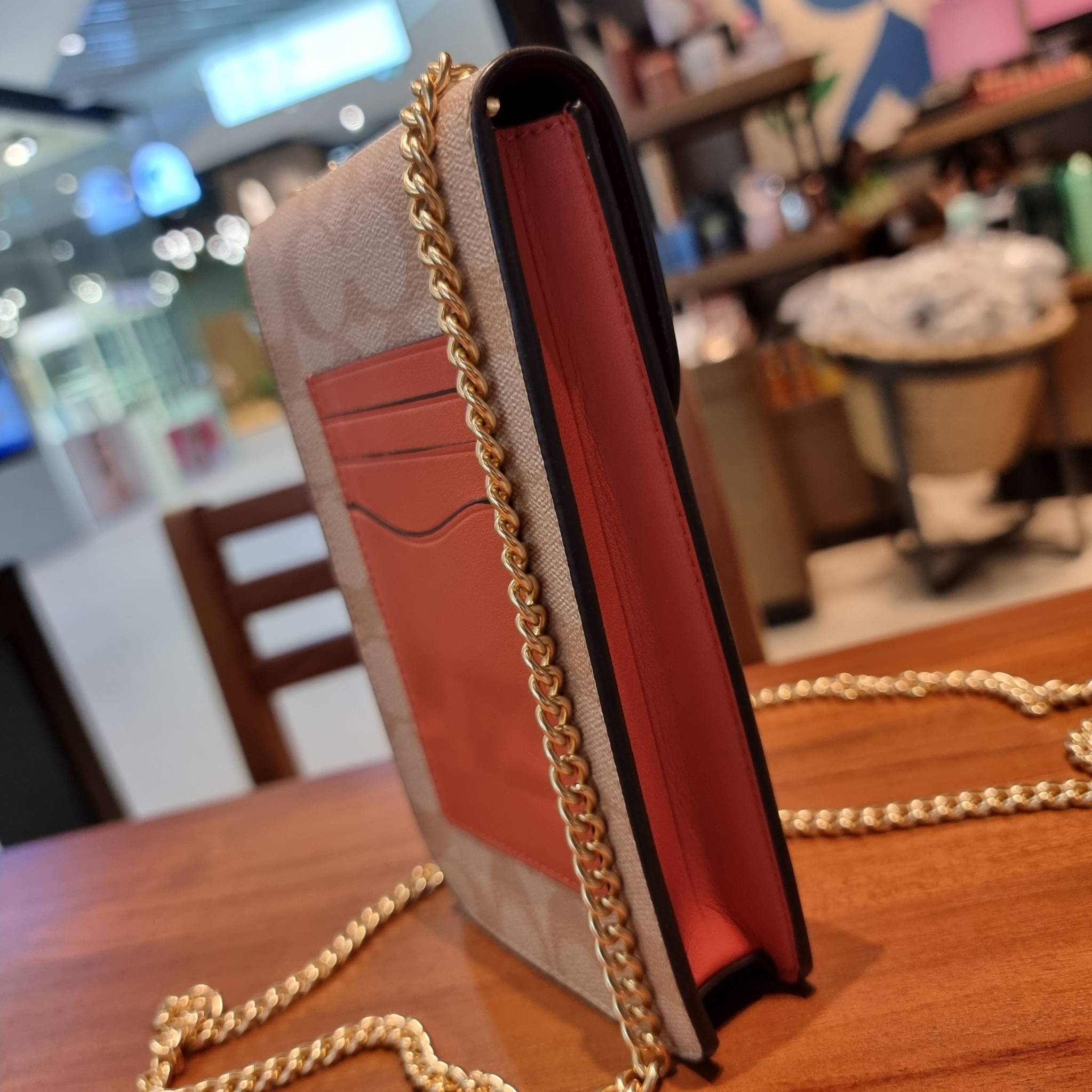 COACH F73486 NORTH/SOUTH PHONE CROSSBODY IN SIGNATURE CANVAS WITH FRUIT 🍒🍓🍋 แจกความสดใสกันอีกครั้ง!! กับกระเป๋าสะพายเอนกประสงค์ Case phone ใส่โทรศัพท์มือถือได้ทุกรุ่น ดีไซน์ลายผลไม้ฉ่ำๆ สวยมีเสน่ห์ 💖 วัสดุหนังแคนวาสคุณภาพ ฝ