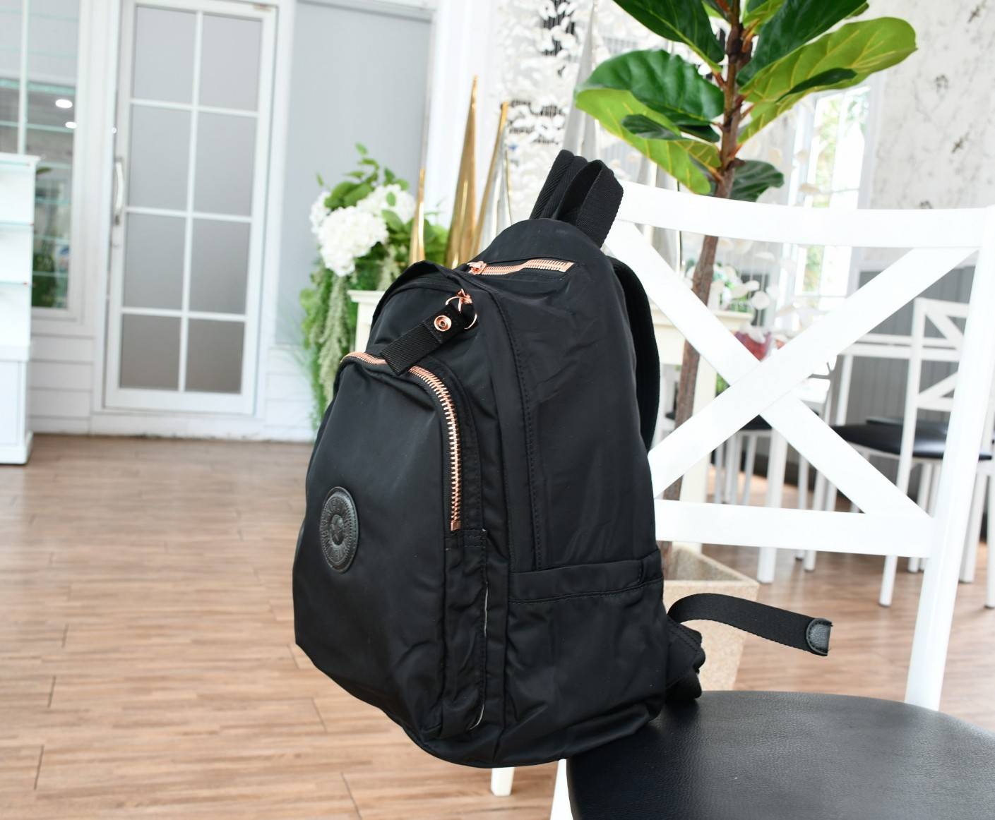 KIPLING Delia Medium Backpack with Front Pocket and top handle กระเป๋าเป้ไซส์ขนาดกลาง วัสดุ Polyester100% อะไหล่สี Rose gold พวงกุญแจmonkeyและพู่หนังrubber เพิ่มความหรูหรา