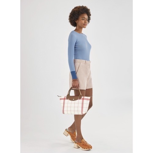 LONGCHAMP LE PLIAGE TORCHON Top handle bag - Red กระเป๋าถือขนาดเล็ก วัสดุผ้าฝ้าย อะไหลเงิน ตัดแต่งด้วยหนังวัวแท้ ผสมผสานแนวคลาสสิกแบบมินิมอลศิลปะการพับกระดาษแบบญี่ปุ่นดั้งเดิม