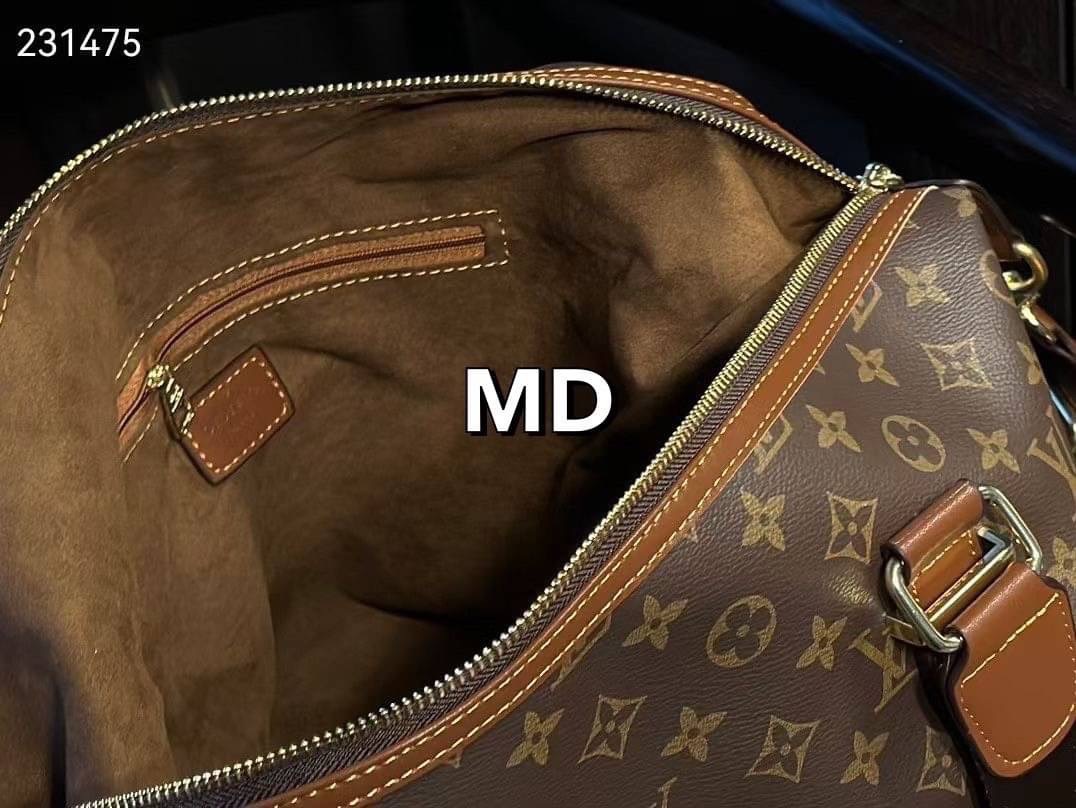 LV KEEPALL Monogram Canvas Bag 40cm กระเป๋าเดินทางสุดคลาสสิค ขนาดจุใจพิมพ์ลายโมโนแกรมแคนวาส ไอเท็มที่จะทำให้การเดินทางไม่ธรรมดาอีกต่อไป ด้วยดีเทลความเป็นเอกลักษณ์ เรียบแต่หรู