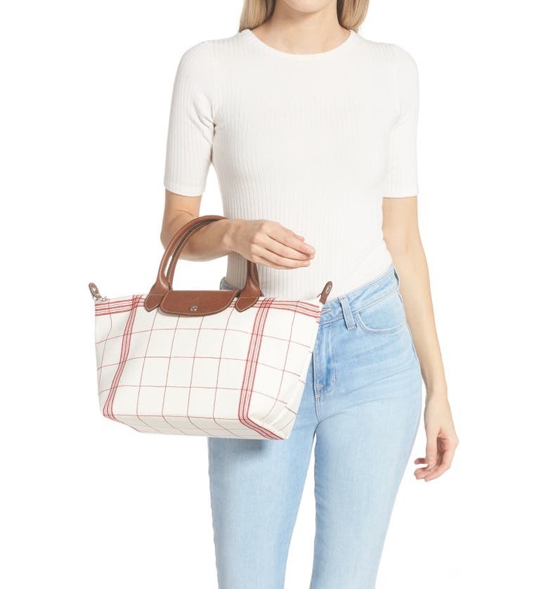 LONGCHAMP LE PLIAGE TORCHON Top handle bag - Red กระเป๋าถือขนาดเล็ก วัสดุผ้าฝ้าย อะไหลเงิน ตัดแต่งด้วยหนังวัวแท้ ผสมผสานแนวคลาสสิกแบบมินิมอลศิลปะการพับกระดาษแบบญี่ปุ่นดั้งเดิม