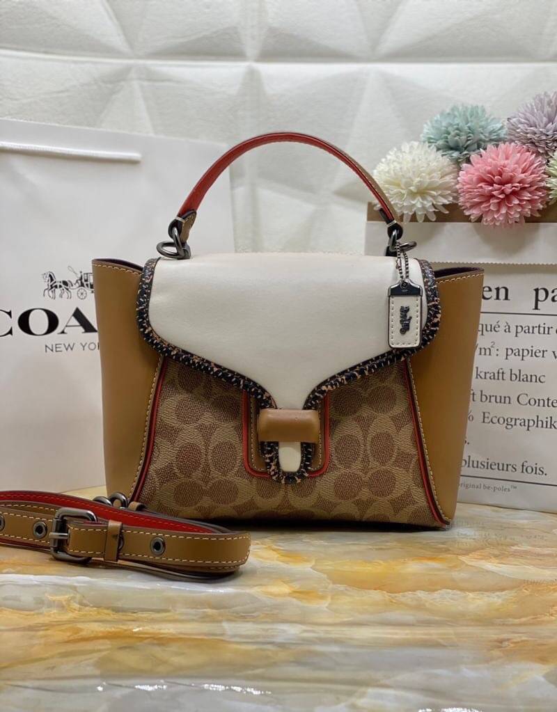COACH COURIER CARRYALL 23 IN COLORBLOCK SIGNATURE CANVAS WITH SNAKESKIN DETAIL ((3791)) ห้ามพลาดทีเดียว สวยงามมากๆค่ะ!! กระเป๋าถือ//สะพายครอสบอดี้ร์ได้ วัสดุหนังแท้น้ำหนักเบาค่ะ รุ่นนี้โดดเด่นตรงลายของหนังผสมกันได้ลงตัวหรูมากๆ เปิดปิดกระเป๋าแบบกดล็อค ปากก