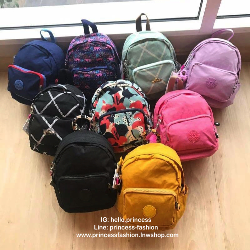 Kipling MINI BACKPACK Small backpack กระเป๋าเป้มินิ ส วัสดุไนล่อน กันน้ำได้ รูปทรงสวย ขนาดกะทัดรัด น้ำหนักเบา สีสันสดใส มาพร้อมสายถอดออกได้ สามารถ เลื่อนปรับสายสะพายได้ 2 แบบสะพายไหล่ , แบบเป้สะพายหลัง ด้านหน้ามีช่องซิป 1 ช่อง ช่องหลักด้านกว้างมีช่องซิป แ