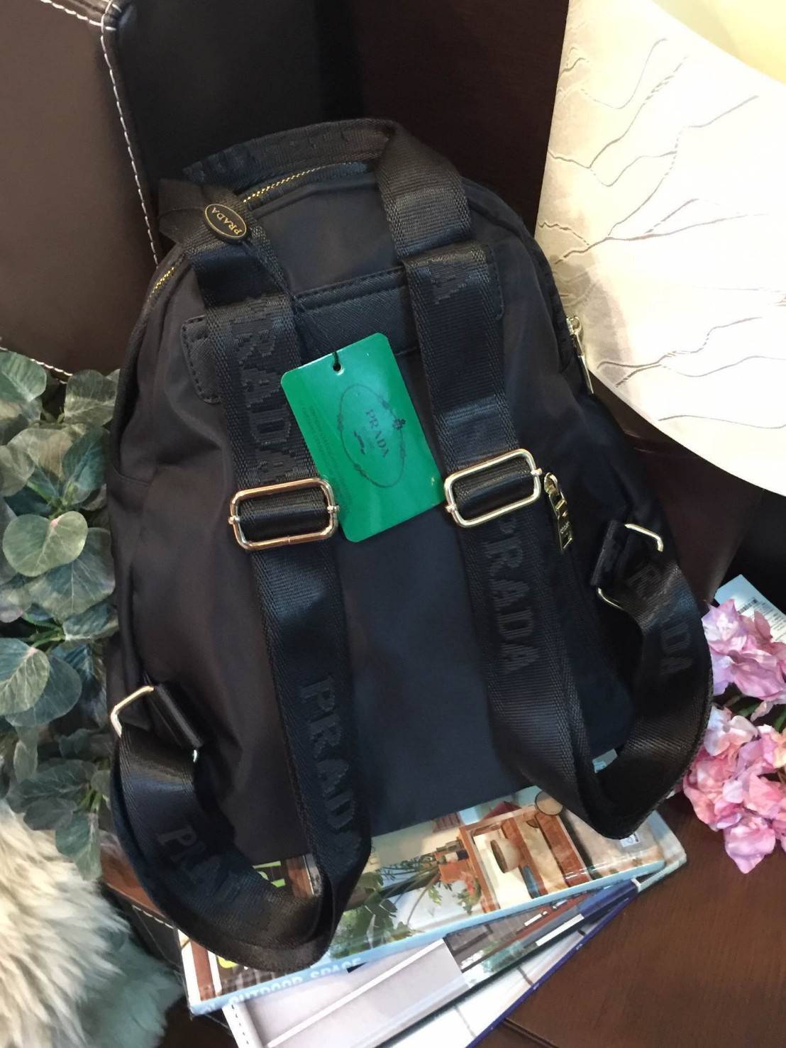 Don't Miss! PRADA NYLON BACKPACK กระเป๋าสะพายเป้ พรีเมี่ยมกิ้ฟจากเคาน์เตอร์ต่างประเทศรุ่น Limited edition ที่ฮ๊อตสุดๆ วัสดุเป็น Nylon เนื้อหนาคุณภาพดีตามแบบฉบับของแบรนด์ ขนาดกำลังดี น้ำหนักเบา ด้านหน้าเป็นลายหมีปั๊กกลิ้ตเตอร์โลโก้แบรนด์อะไหล่ทองหรู ภ