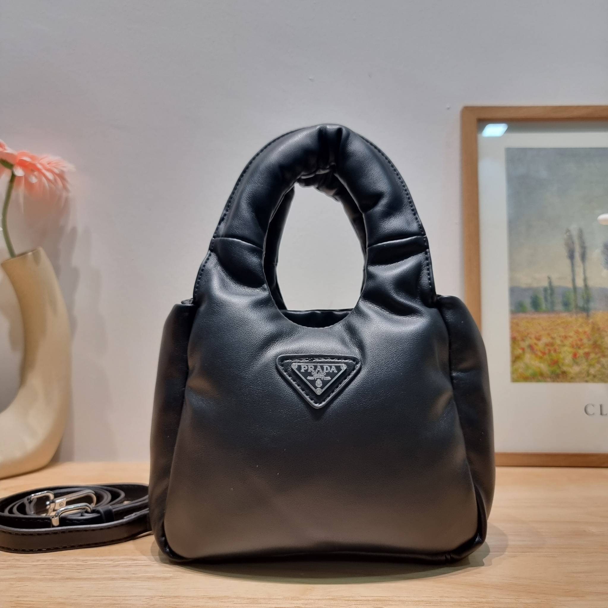 PRADA Small padded Soft nappa-leather bag พร้อมส่ง 4 สี น้องใหม่ล่าสุด กับคอลเลคชั่นที่ทำออกมาตอบโจทย์ได้ทุกไลฟ์สไตล์ **ราคาพิเศษสุดคุ้ม งานสวยเกินราคา