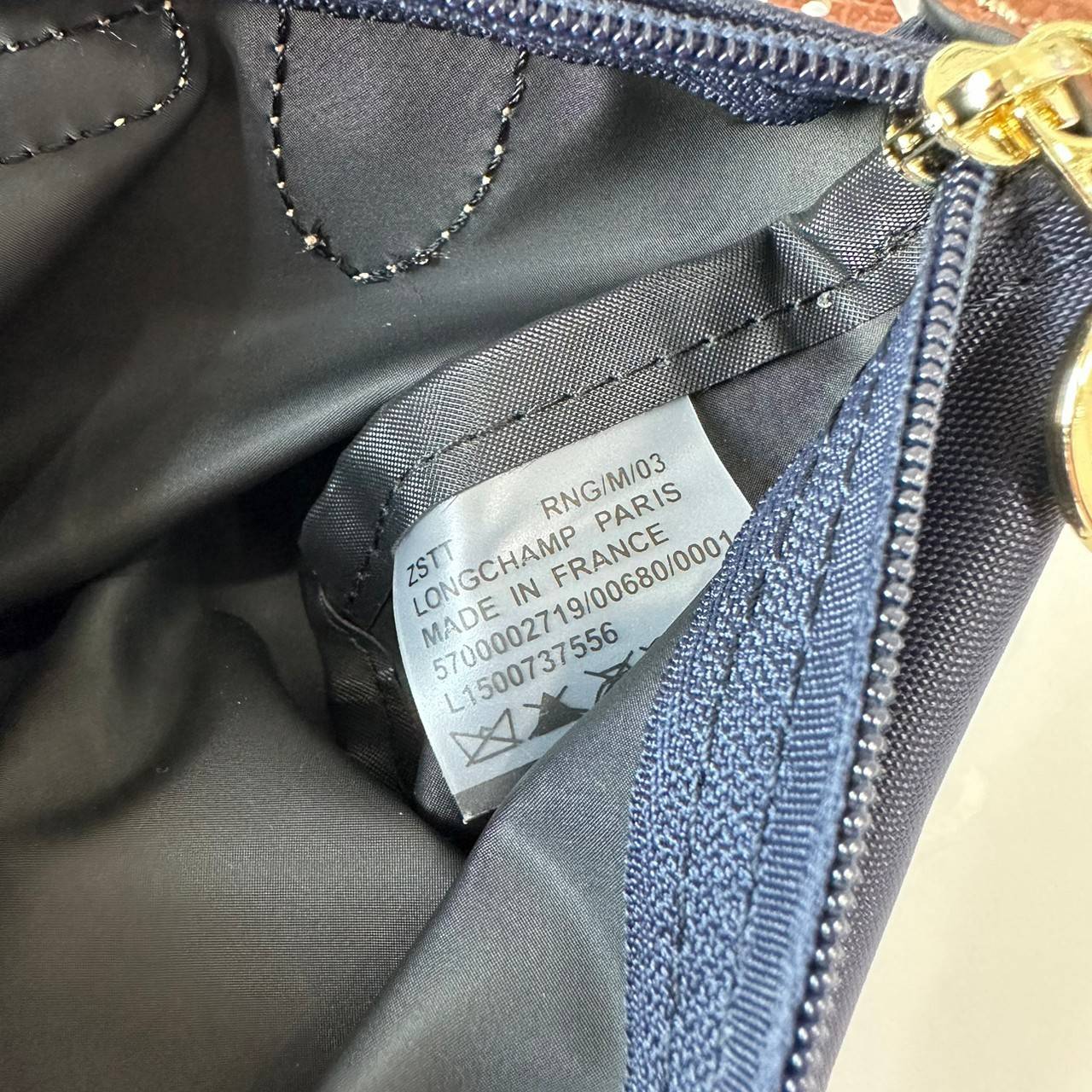 LONGCHAMP LE PLIAGE ORIGINAL Pouch with handle กระเป๋าใบเล็กขนาดกระทัดเหมาะกับใส่ของจำเป็นจุกจิก กันน้ำได้ พร้อมส่ง