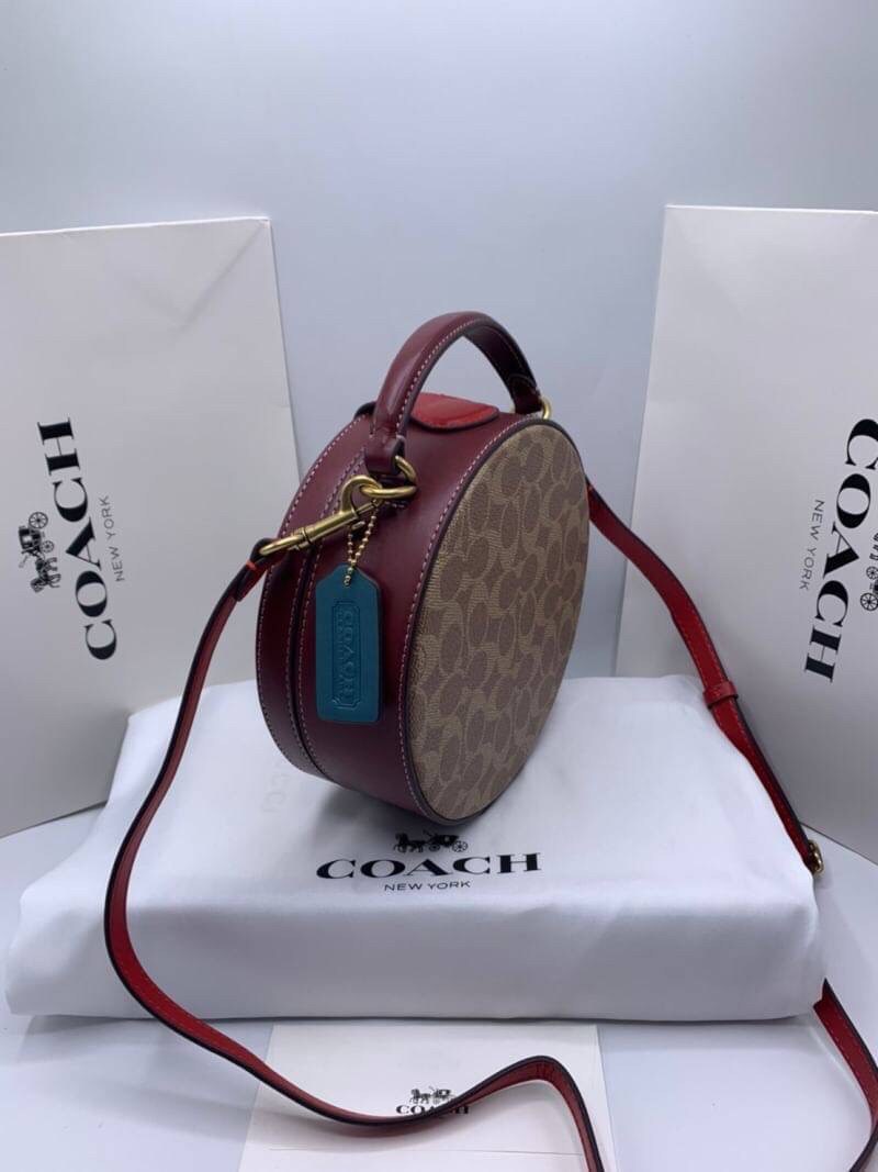 COACH LUNAR NEW YEAR CIRCLE BAG IN SIGNATURE CANVAS กระเป๋าทรงกลม ถือและสะพายข้างได้ วัสดุหนังแท้ ลาย C สวยหรู!! ตามแบบฉบับแบรนด์ ดูแพงมาก ราคาสุดคุ้มแบบนี้ ต้องมีไว้ใช้สักใบน้า!!