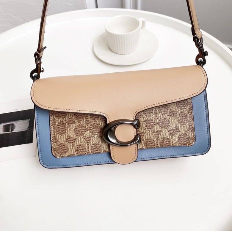 Coach Tabby Shoulder Bag 26 Polished pebble leather, suede and refined calf leather Inside zip and multifunction pockets