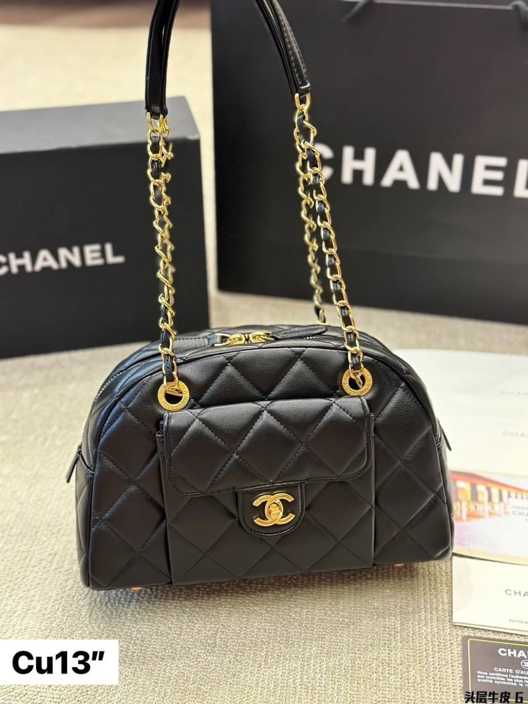 CHANEL 24A Bowling Bag กระเป๋าสะพายทรงโบลิ่ง รุ่นท็อปฮิต งานหนังเรียบ อะไหล่สีทองสวยหรู ขนาดกำลังสวย รูปทรงคลาสสิคใช้งานได้สะดวก