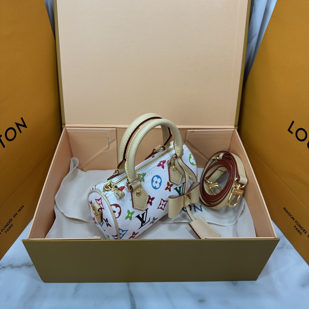 ORI | LV x TM Nano Speedy Bag Murakami กระเป๋าสะพายสปีดี้นาโนไซส์เล็ก เผยความมีชีวิตชีวาปรับดีไซน์โทนสีสดใส สวยเรียบหรู ผู้ดี