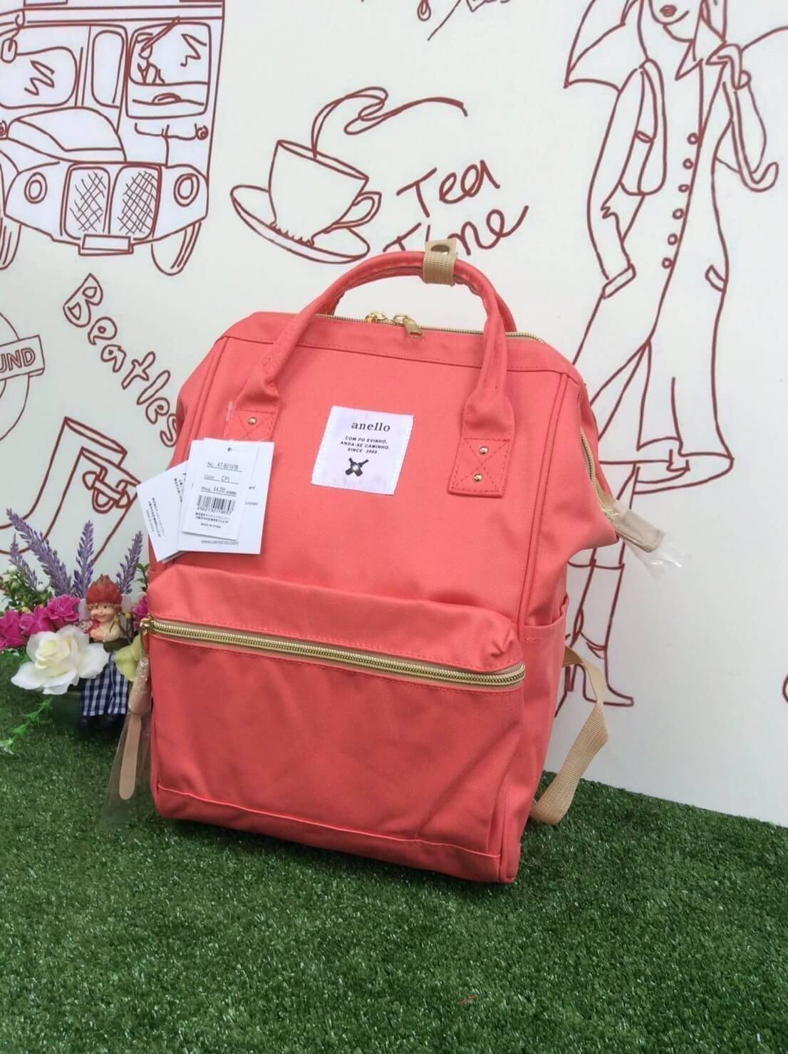 ANELLO POLYESTER CANVAS RUCKSACK รุ่นมินิ แบรนด์ดังสุดฮิตที่กำลังดังในประเทศญี่ปุ่น กระเป๋าเป้สไตล์คาวาอิ รูปทรงแปลกใหม่มีสไตล์เป็นของตัวเอง วัสดุผ้าแคนวาส ปากกระเป๋ากว้างมีโครง ง่ายสำหรับเวลาใส่สัมภาระ ภายในมีช่องเล็กและช่องใหญ่ใช้งานง่าย เปิดปิดด้วยซิปค