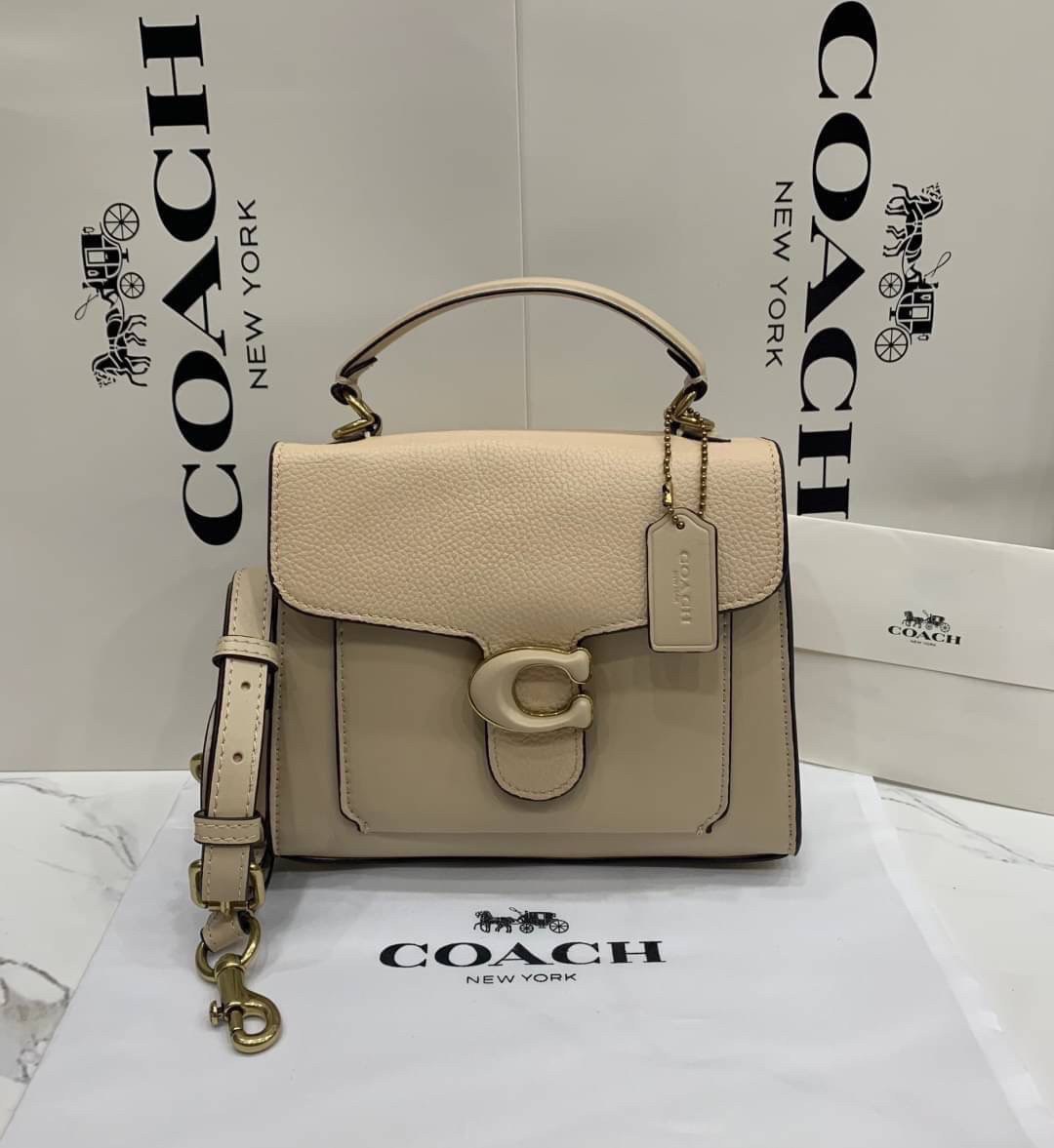 COACH TABBY TOP HANDLE 20 พร้อมส่งที่ไทยค่ะ! กระเป๋าหิ้ว//สะพายข้างได้ หนังแท้อย่างดี กหนึ่งใบทำหนังสองลายได้อย่างสวยงาม พร้อมโลโก้รุ่นใหม่ล่าสุดดูดีมากๆค่ะ เปิดปิดกระเป๋าแบบกดล็อค ภายในมีช่องหลักสองช่อง ใส่มือถือได้ทุกรุ่น;กระเป๋าเงินใบกลางได้;ของจำเป็นจ