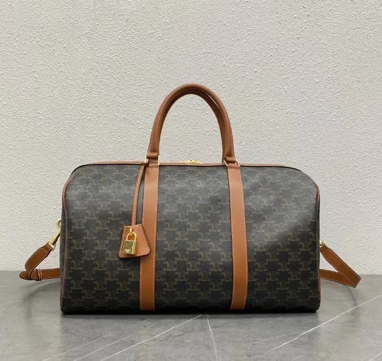 ORI หนังแท้ | CELINE Large Travel Bag IN Triomphe Canvas and Leather กระเป๋าสะพายสไตล์เดินทาง keepall ใบใหญ่จุสัมภาระได้เยอะ หนังขึ้นลาย Signature สวยหรูสุดคลาสสิค ดีไซน์ไม่มีเอ้าท์
