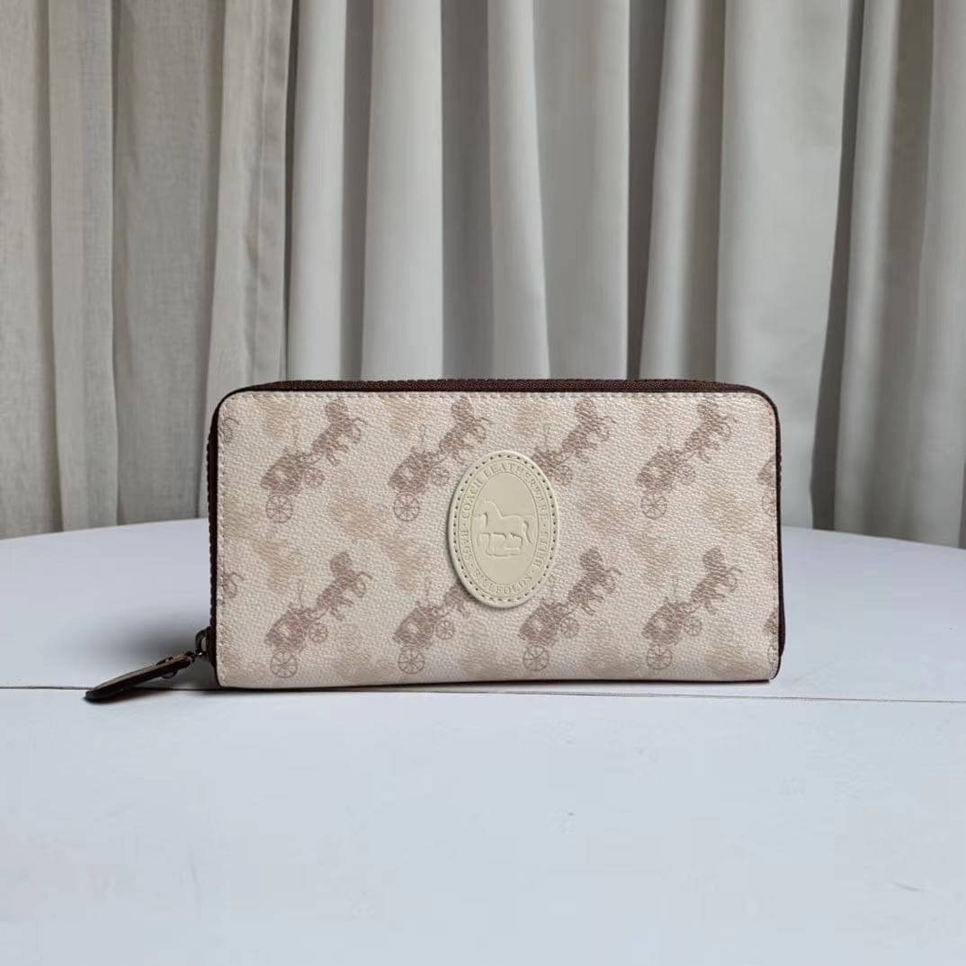 COACH Accordion Zip Wallet in Signature Coated with Leather กระเป๋าสตางค์ใบยาว เปิด-ปิดกระเป๋าด้วยซิปรอบ ด้านในมีช่องใส่บัตร ช่องใส่ธนบัตร และช่องซิปใส่เหรียญค่ะ