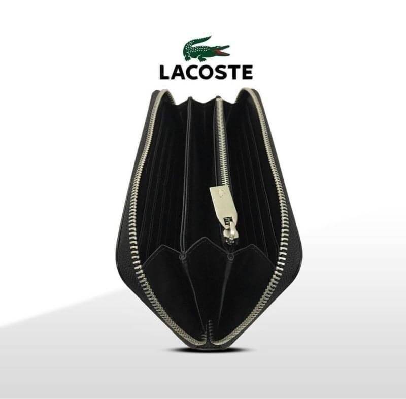 LACOSTE FACTORY LONG WALLET กระเป๋าสตางค์ใบยาวรุ่นใหม่ล่าสุดหนังสวยอยู่ทรงเปิดปิดด้วยซิปรอบด้านหน้ามีโลโก้แบรนด์เรียบหรู ภายในมีโลโก้ ช่องซิป ช่องใส่บัตรหลายช่องใส่มือถือ iphone8 เหรียญ บัตรได้เยอะ ตัวจริงสวยน่าใช้คลาสสิคไม่มีเอ้าท์ ราคาสุดคุ้ม สินค้ามาพร