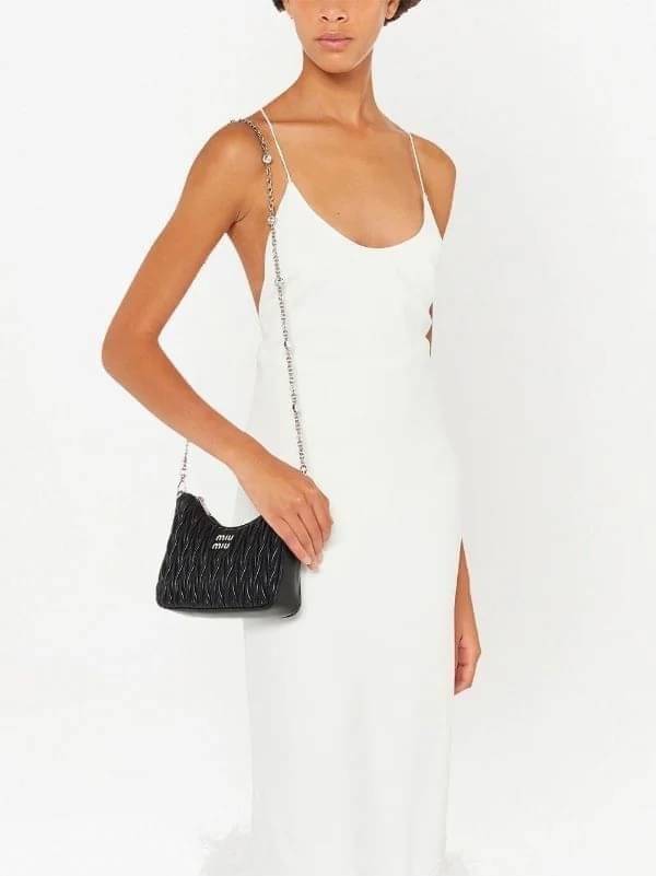 MIU MIU matelasse nappa leather shoulder bag กระเป๋าสะพายข้าง สายสะพายประดับไข่มุกและคริสตัล ให้ความละมุม ลุคคุณหนูน่ารักสุดๆคะ