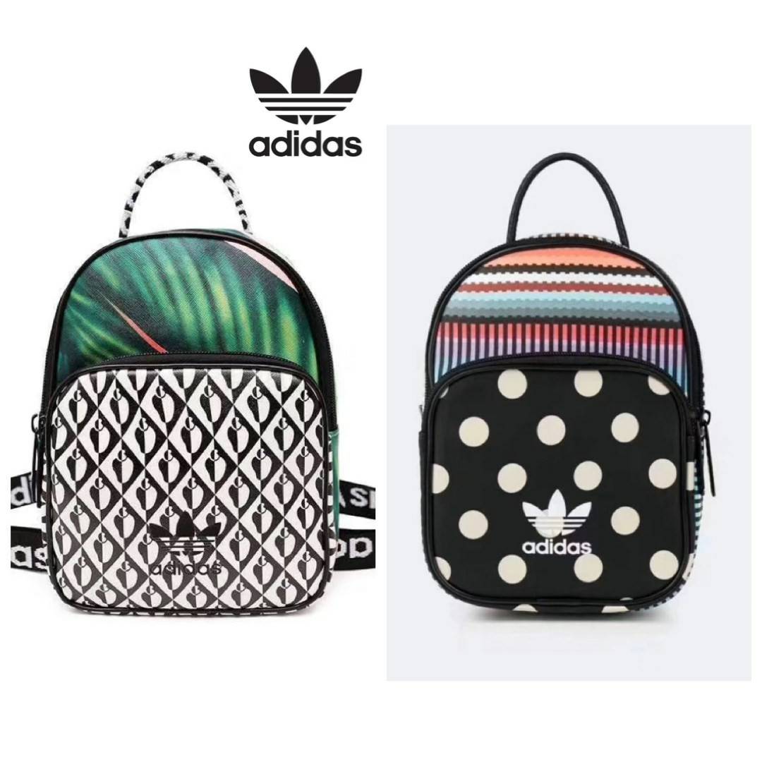 ADIDAS AUTHENTIC IP MINI BACKPACK กระเป๋าที่เปลี่ยนได้ถึง3ลุคช์ ซึ่งเป็นได้ทั้งเป้ สะพาย ครอสบอดี้ หรือจะถือเก๋สุดๆ วัสดุหนังpu แต่งลายหนังด้านหน้า หนังนิ่มถือจับสบายมือ มีช่องซิปใช้งาน2ช่อง ใส่กระเป๋าสตางค์ยาว/โทรศัพท์มือถือและของจุกจิกได้เยอะเลยคร้า!!