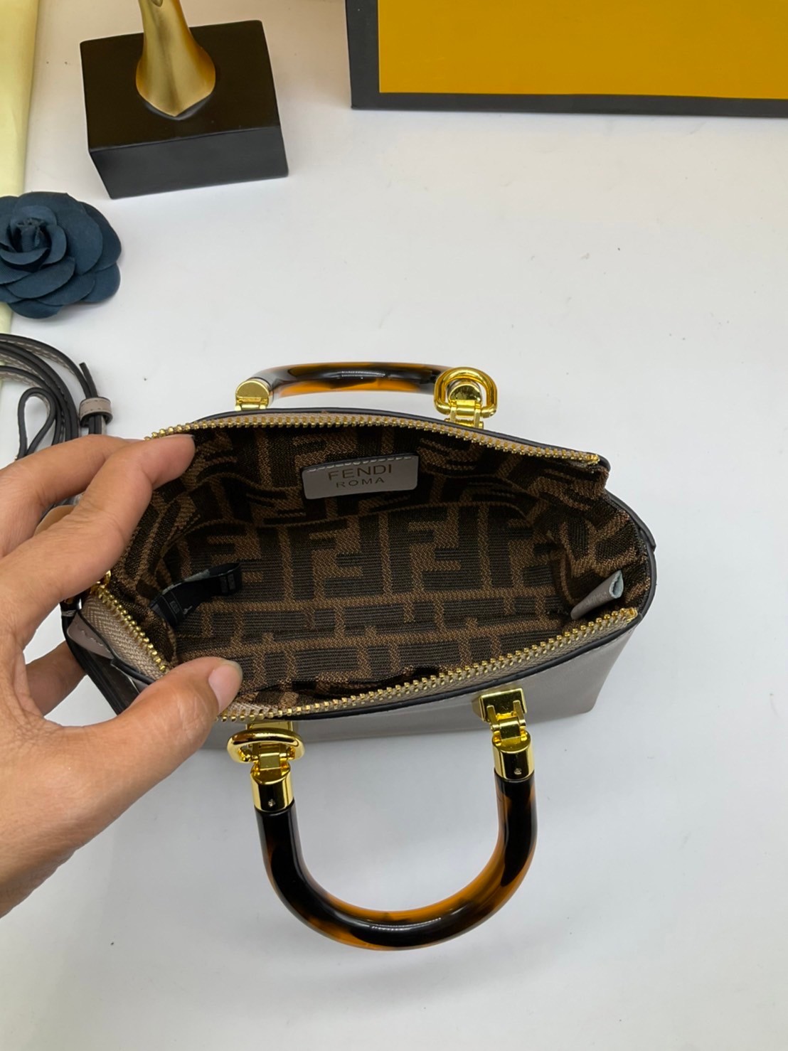 FENDI By The Way Mini Bag พร้อมส่งที่ไทย ภาพถ่ายจากงานขายจริง Iconic mini By The Way Boston bag made FENDI ROMA lettering and rigid tortoiseshell-effect plexiglass handles.
