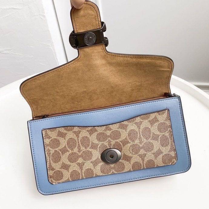 Coach Tabby Shoulder Bag 26 Polished pebble leather, suede and refined calf leather Inside zip and multifunction pockets