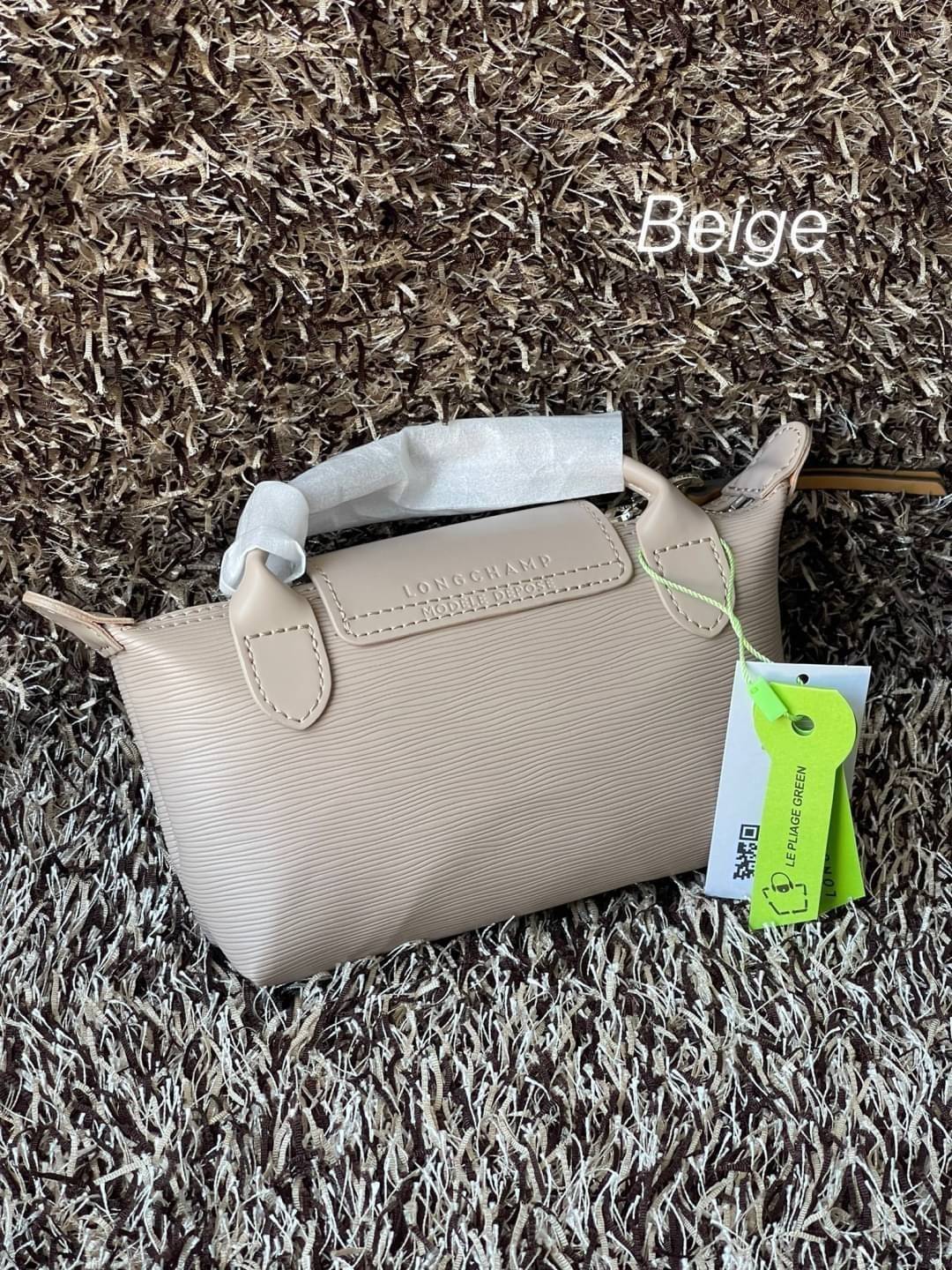LONGCHAMP LE PLIAGE CITY POUCH WITH HANDLE Taupe - Canvas (ไม่มีสายยาว) กระเป๋าเครื่องสำอางแบบมีซิปพร้อมหูหิ้วใบนี้เหมาะสำหรับการจัดระเบียบกระเป๋าของคุณ
