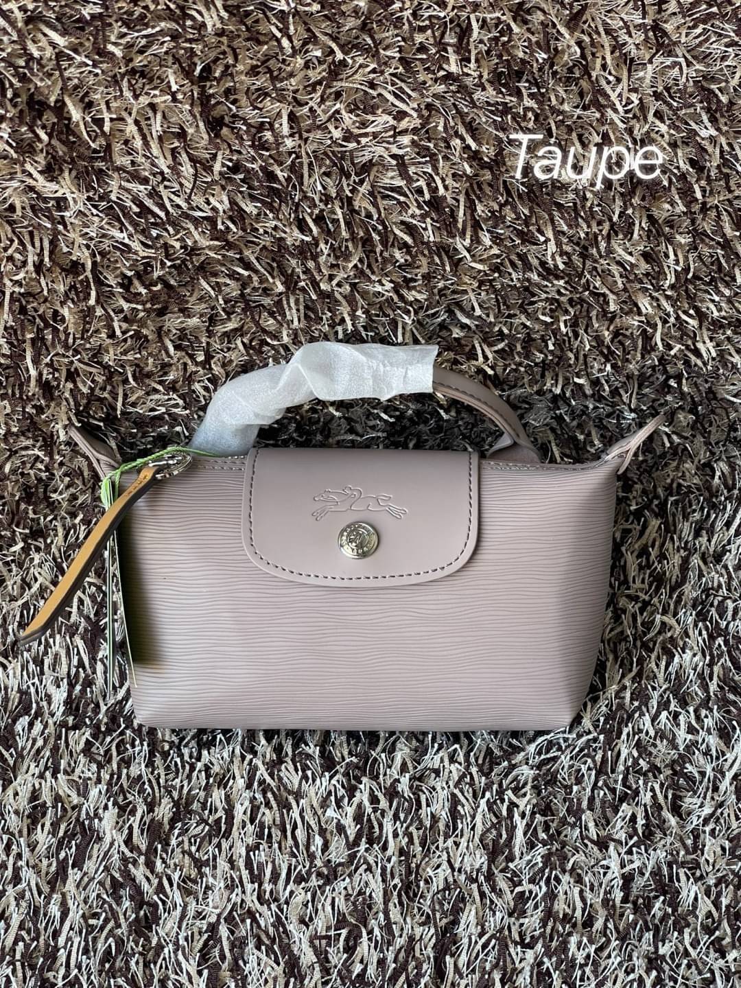 LONGCHAMP LE PLIAGE CITY POUCH WITH HANDLE Taupe - Canvas (ไม่มีสายยาว) กระเป๋าเครื่องสำอางแบบมีซิปพร้อมหูหิ้วใบนี้เหมาะสำหรับการจัดระเบียบกระเป๋าของคุณ