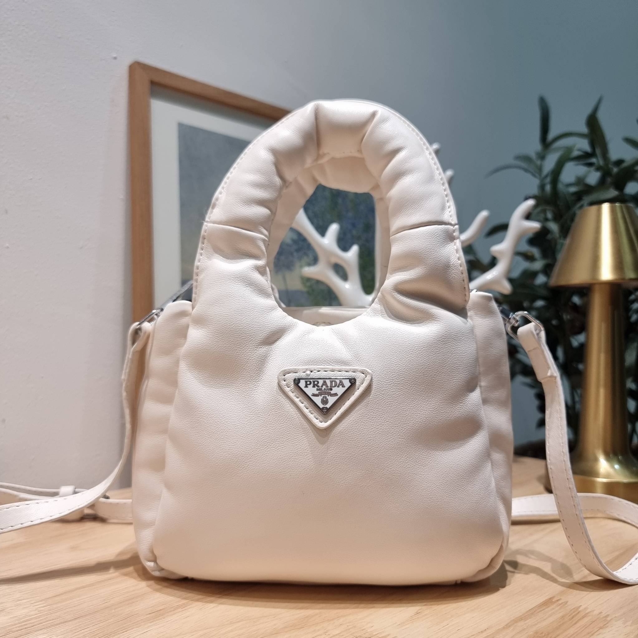 PRADA Small padded Soft nappa-leather bag พร้อมส่ง 4 สี น้องใหม่ล่าสุด กับคอลเลคชั่นที่ทำออกมาตอบโจทย์ได้ทุกไลฟ์สไตล์