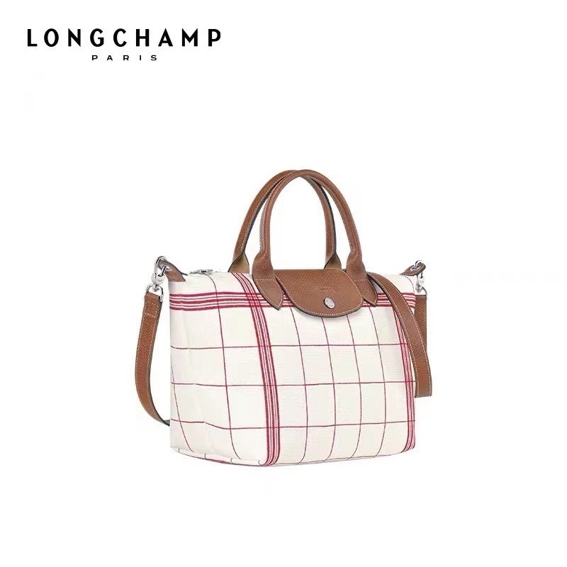 LONGCHAMP LE PLIAGE TORCHON Top handle bag - Red กระเป๋าถือขนาดเล็ก วัสดุผ้าฝ้าย อะไหลเงิน ตัดแต่งด้วยหนังวัวแท้ ผสมผสานแนวคลาสสิกแบบมินิมอลศิลปะการพับกระดาษแบบญี่ปุ่นดั้งเดิม