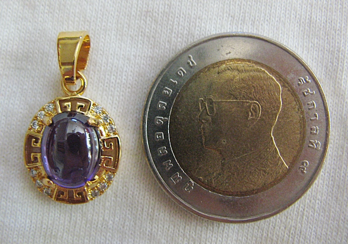 จี้พลอยมณีใต้น้ำ(เพชรพญานาค)สีม่วงแบบเล็กเลี่ยมกรอบประดับเพชร(ทุกราศี)เสริมโชคเสริมดวงค่ะ