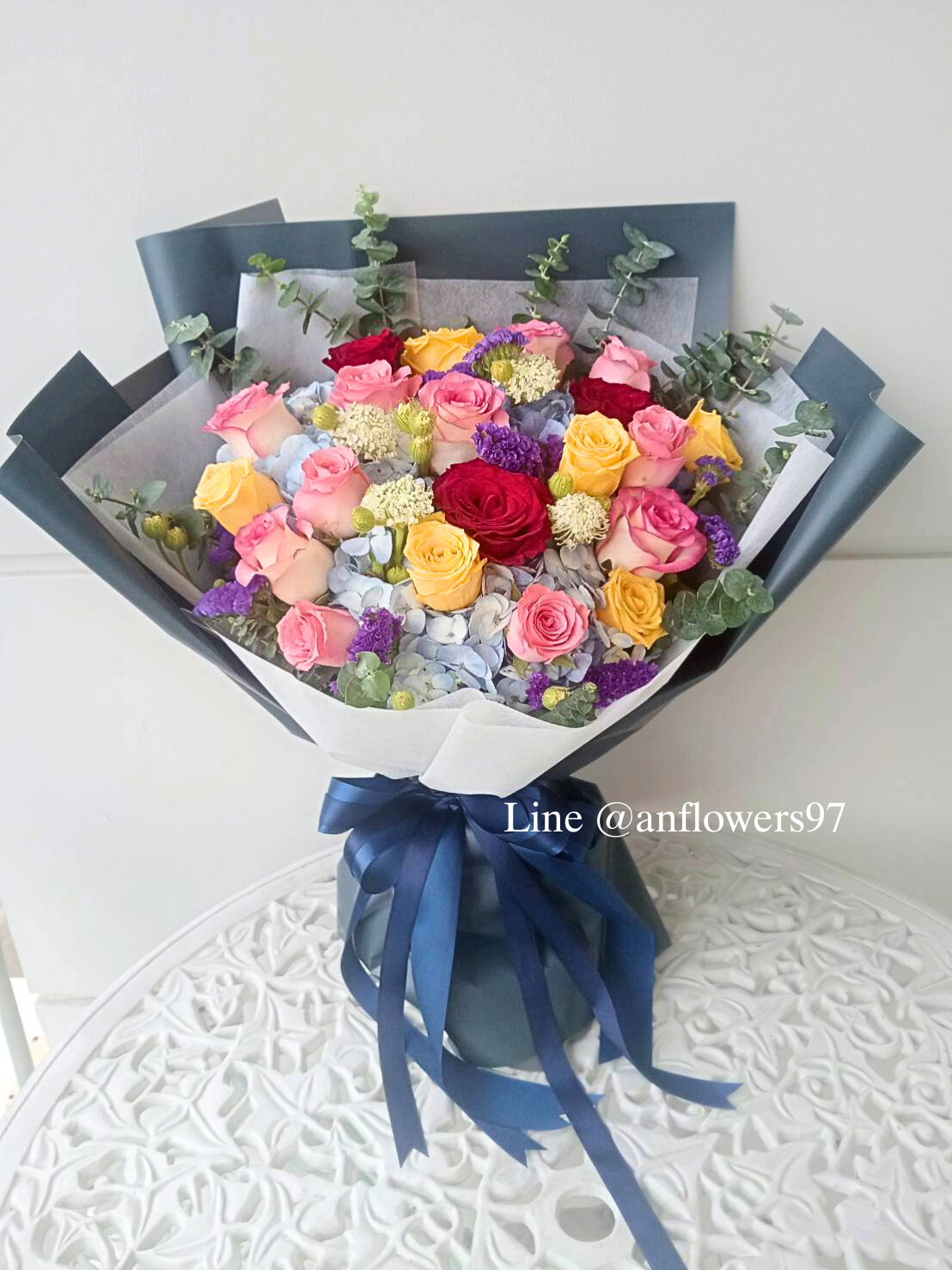ช่อดอกไม้รับปริญญา