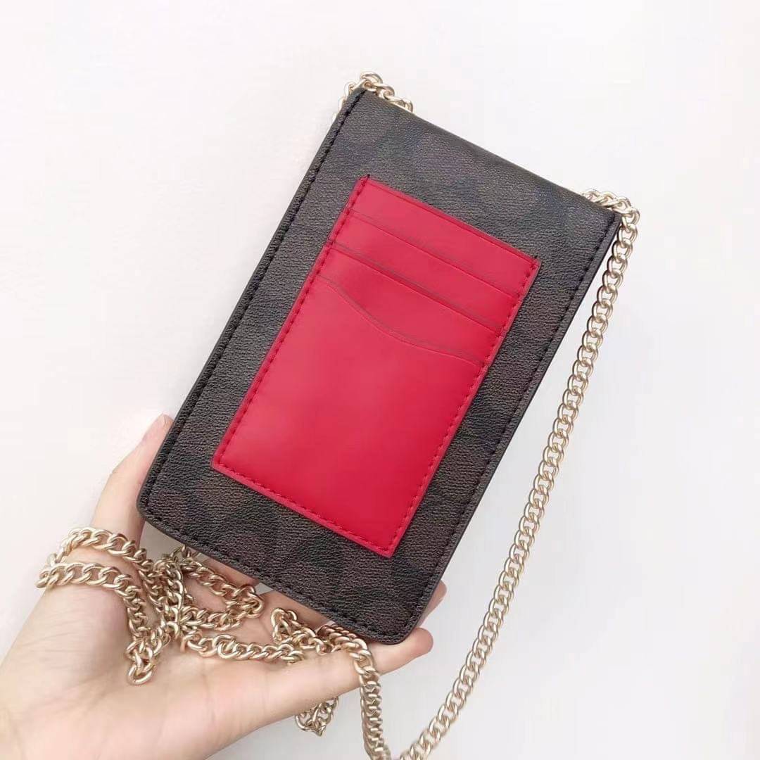 COACH PHONE CASE CROSSBODY BAG ((73486//76988//76357//39955//91046)) COACH NORTH/SOUTH CROSSBODY IN SIGNATURE CANVAS กระเป๋าใส่โทรศัพท์รุ่นนี้ มีความโดดเด่นทั้งดีไซน์และคุณสมบัติในการใช้งาน ด้วยลวดลายที่มีซิกเนเจอร์เป็นเอกลักษณ์แล้ว ด้านหลังยังมีช่องใส่กา